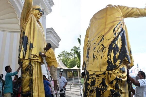karunanidhi defaced statue